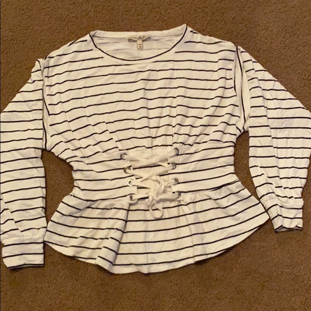 Black and white peplum top.